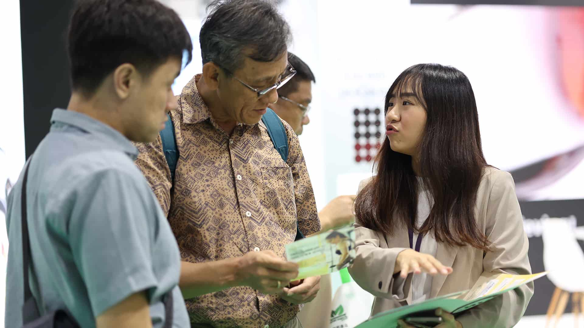 Visitors having a conversation at Vitafoods Asia