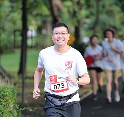 Runner enjoying the 5k Run event organized by Vitafood Asia.