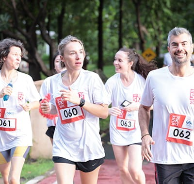 A group of runners participating in the 5k Run event organized by Vitafood Asia.